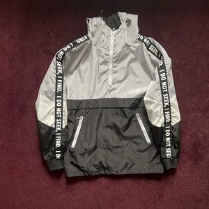 men’s silver and black wind breaker